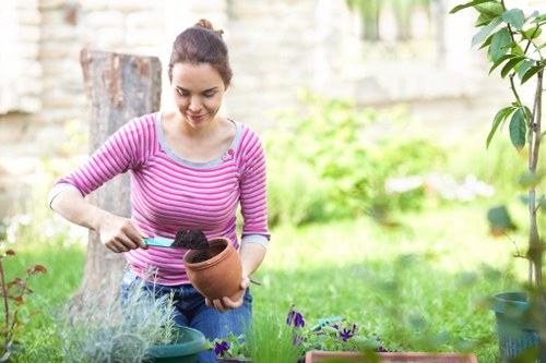 Manager checking site welfare and labour standards during a landscaping inspection